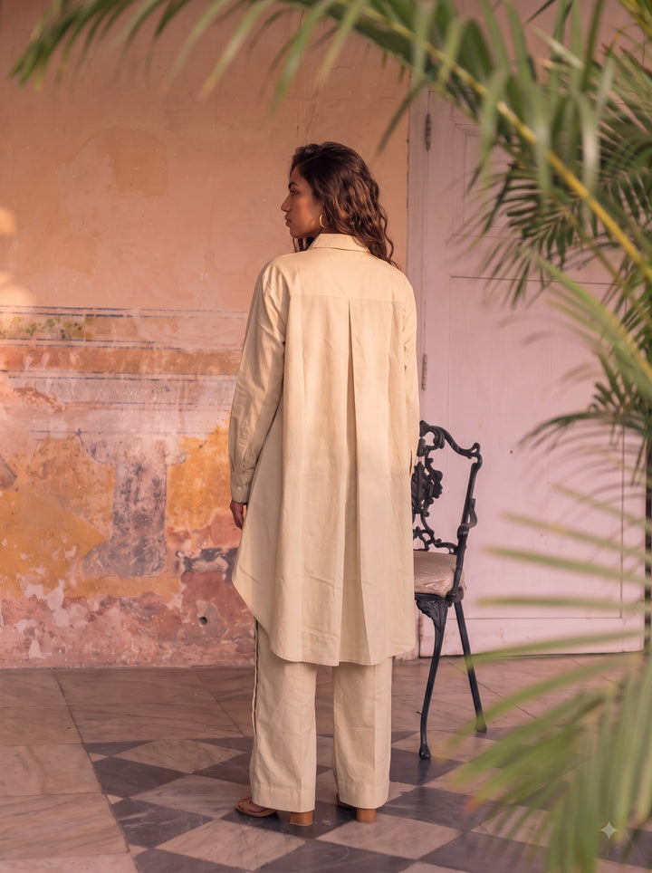 HIGH LOW SHIRT WITH RIVET PANTS IN BEIGE